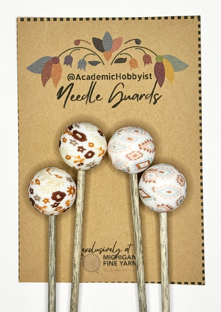 Michigan Fine Yarns AcademicHobbyist Needle Guards - Printed Spheres - Fall Colors 80175146 | Accessories at Michigan Fine Yarns