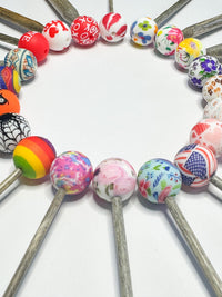 Michigan Fine Yarns AcademicHobbyist Needle Guards - Printed Spheres - Fall Colors 80175146 | Accessories at Michigan Fine Yarns