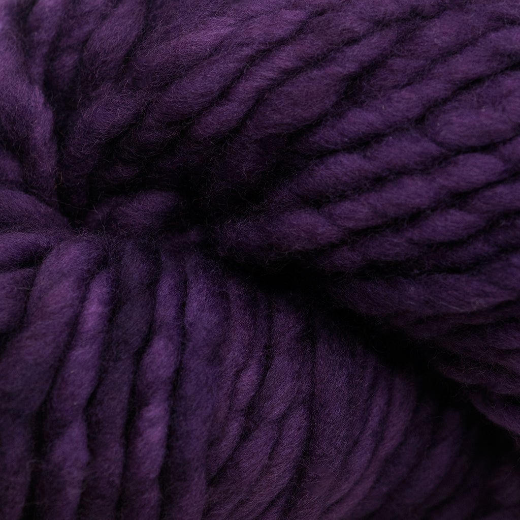 Green Yarn with Black and Purple Patches